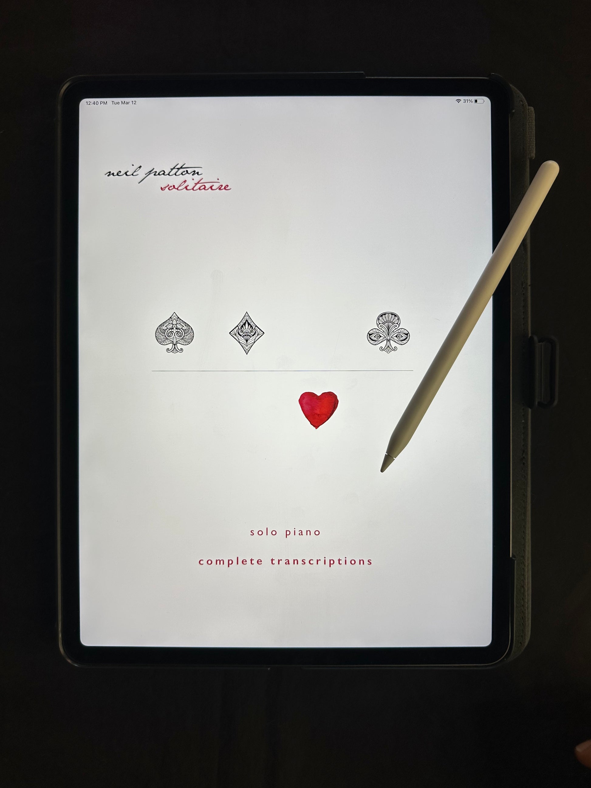 An iPad displaying the cover of Neil Patton's Solitaire Digital Songbook