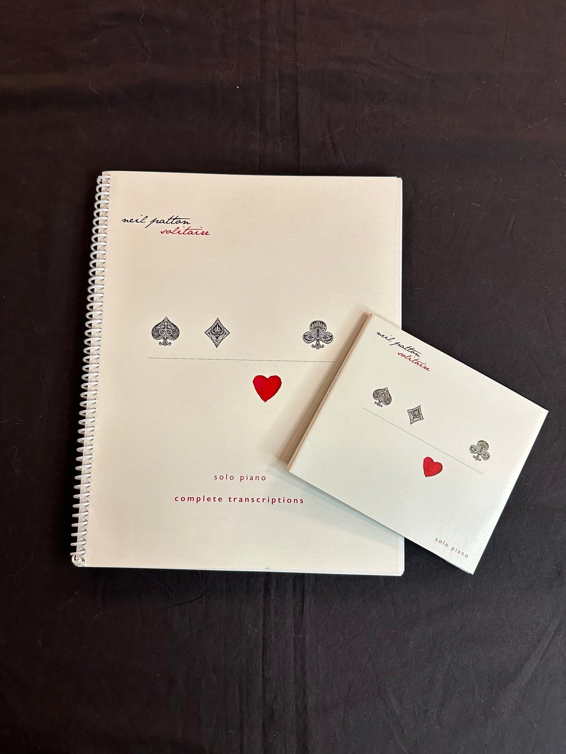 A printed Songbook and Compact Disc for Neil Patton's Solitaire album.